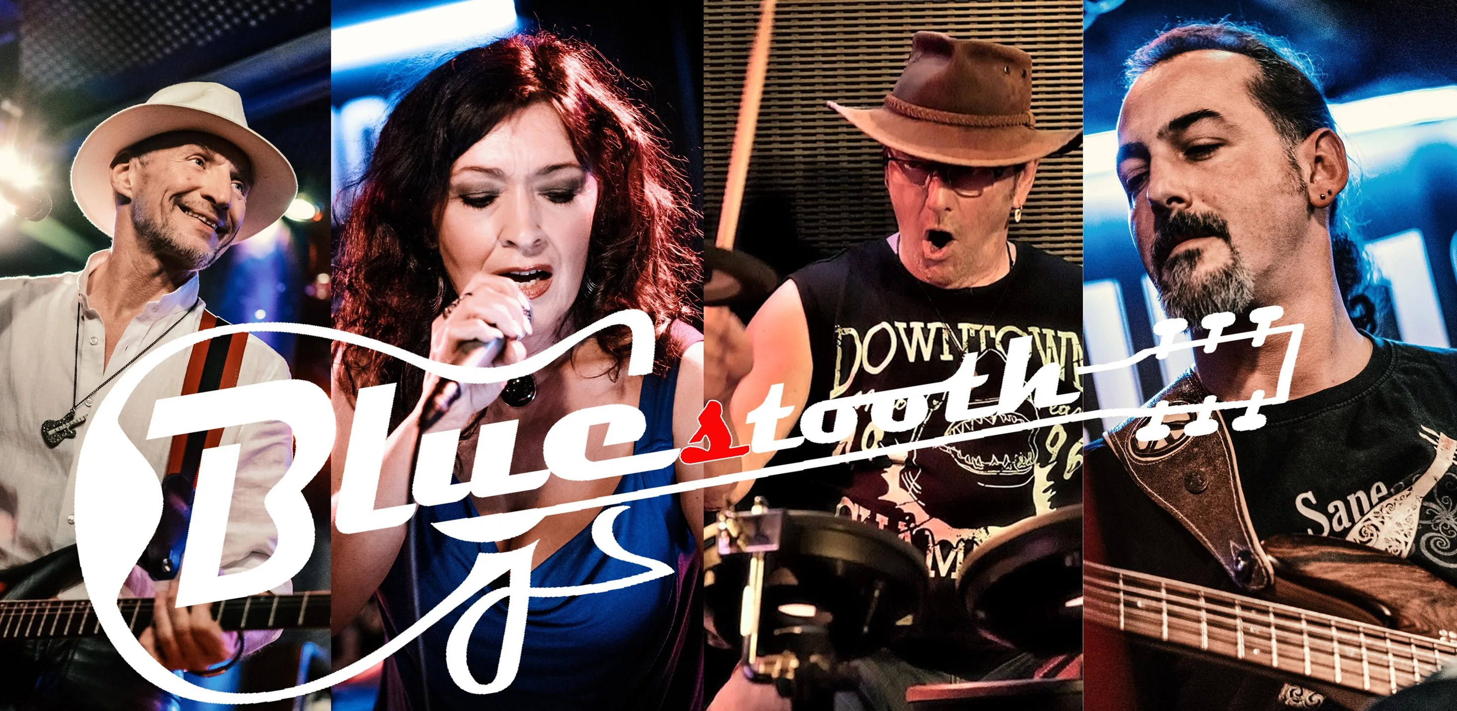 Four musicians on stage performing live.