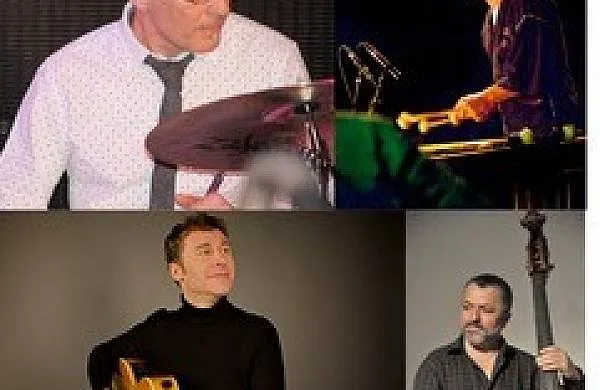 Four musicians playing different instruments in an ensemble.