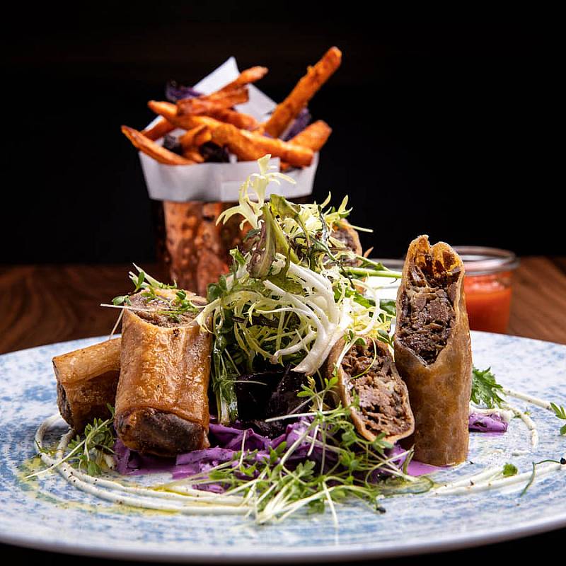 STACKED AND WRAPPED: PULLED BEEF AND PORK ROLLS